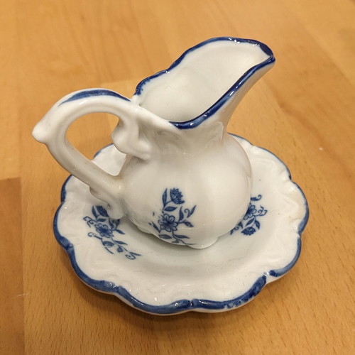 Porcelain jug with saucer like new
