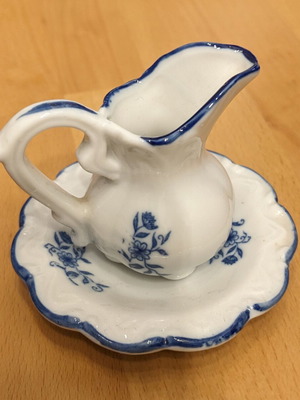 Porcelain jug with saucer like new