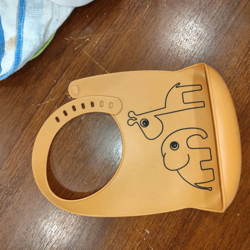 Teether with ring and bib like new for first baby foods