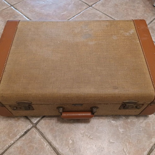 Vintage suitcase from America used with pink satin lining