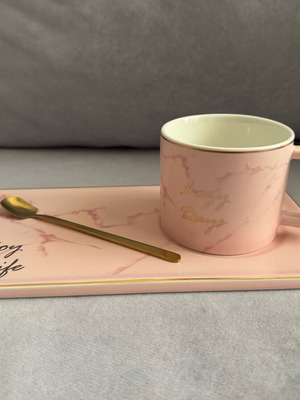 Cup with saucer and spoon like new, modern ceramic style