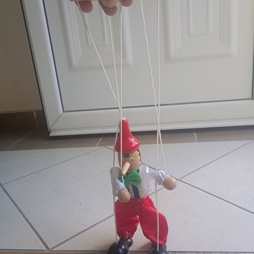 Wooden Pinocchio marionette used