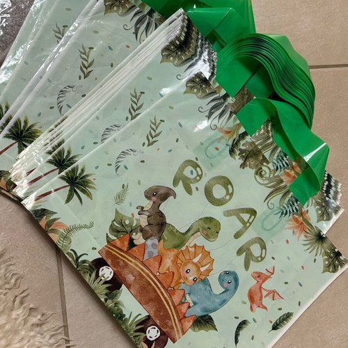 Dinosaur bags like new, pack of 30 for gifts