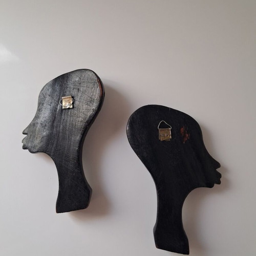 African wooden wall heads set of two used, black, hanging