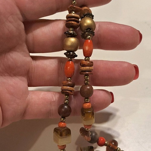 Necklace like new with multicolored beads and gold sailboat pendant