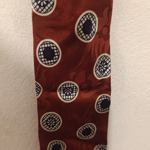 Silk tie red with geometric circular patterns like new