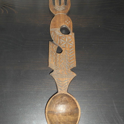 Carved wooden spoon with fork rustic kitchen decoration used