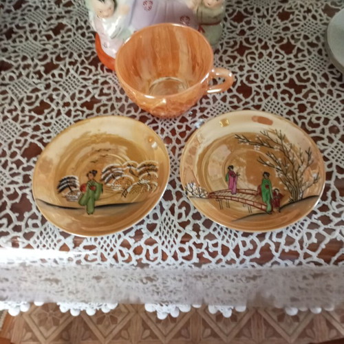 Chinese tea cup with two saucers used, collector's item