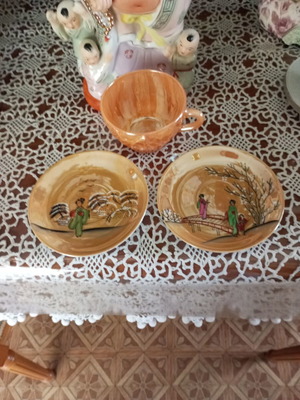 Chinese tea cup with two saucers used, collector's item