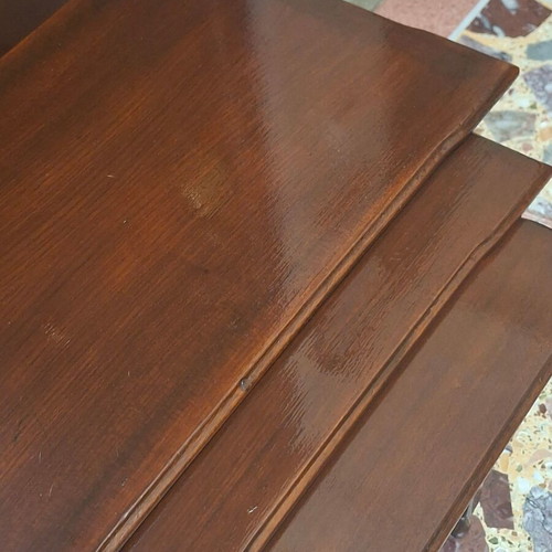 Set of three vintage wooden nesting tables, dark honey color