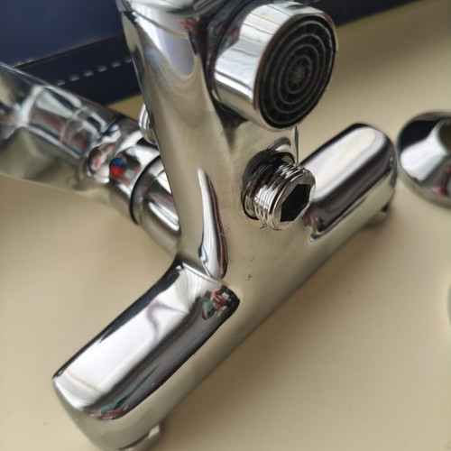 Bathroom faucet used with metal shower holder and soft-touch handle