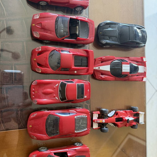 Ferrari miniature models with mechanism, like new, set of 9
