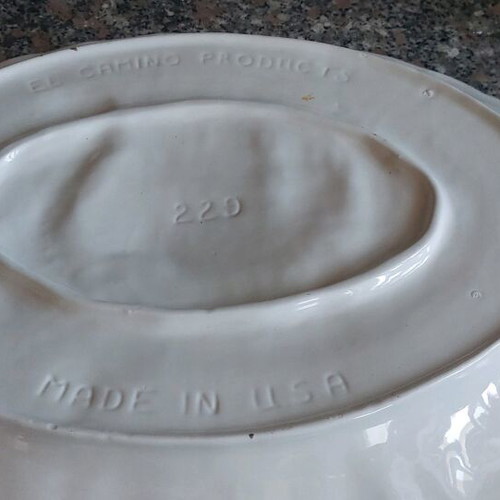 Large ceramic oval platter with embossed design like new