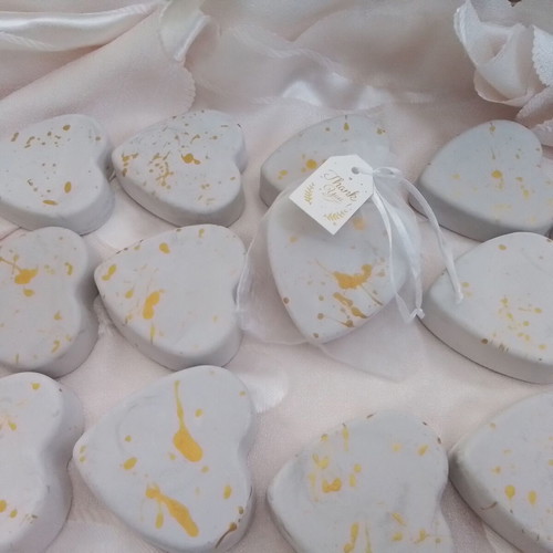 32 scented plaster hearts with gold splatter design