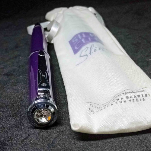 Silk Cut pack used with pen, matches and lighter