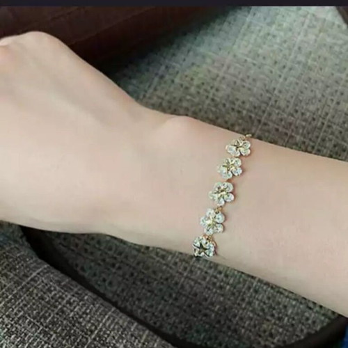Delicate cubic zirconia bracelet new, gold and white