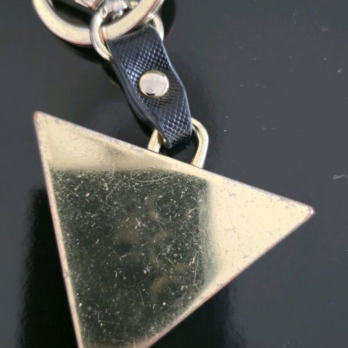 Guess keychain used, gold color