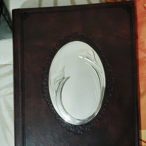 Leather wedding and engagement album like new with silver motif