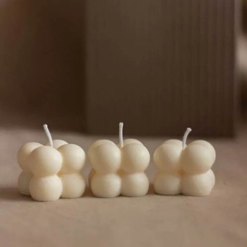 Candle making equipment with molds and decorative items