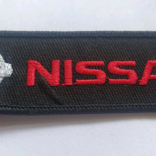 Nissan fabric double-sided keychain new