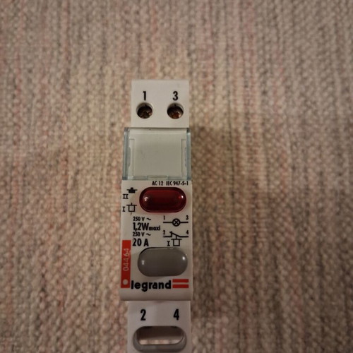 Legrand rail-mounted button switch with indicator light