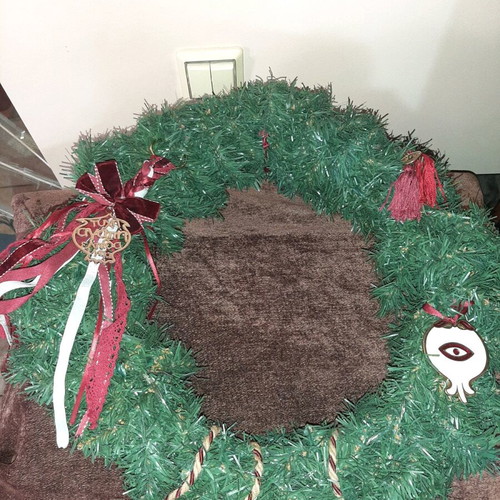 Handmade Christmas wreath with charms and battery lights