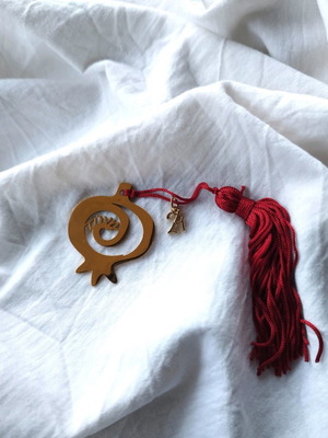 Handmade steel charm with metal elements and tassel made to order