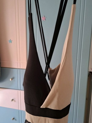 Beige-black dress like new with crisscross straps and cups, size L