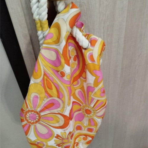 Clinique shoulder bag like new, colorful, cylindrical shape