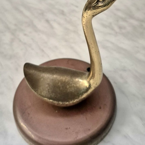 Decorative brass duck on iron base used