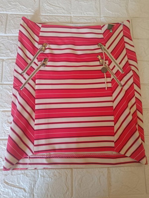 Relish skirt size 42 like new, orange with decorative zippers
