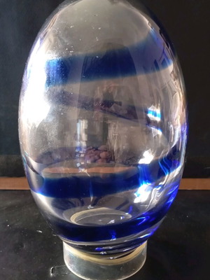 Decorative handmade blown glass egg with blue spiral like new