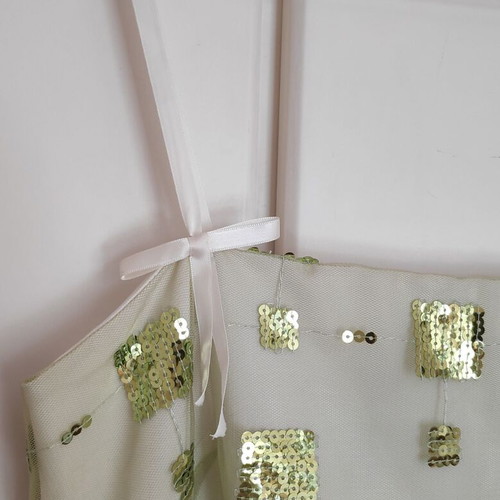 Dress green light with sequins size 48 like new