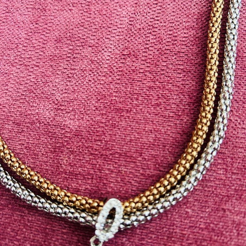 Necklace used in gold and silver color with decorative detail