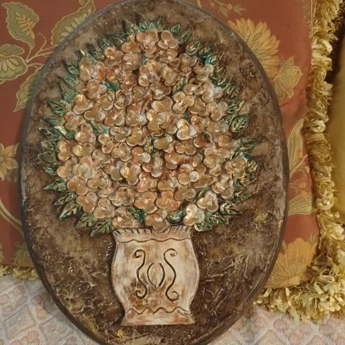 Handmade wall decoration with decoupage and clay flowers