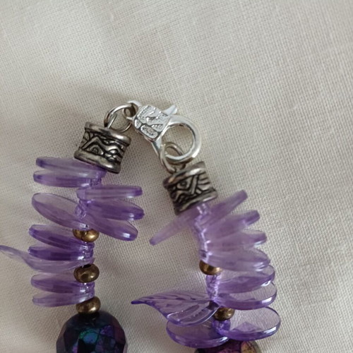 Medium-length necklace used, purple stones in two shapes