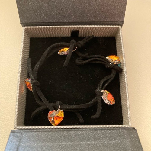 Swarovski bracelet used with 5 suede black hearts