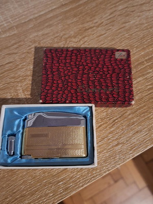 Gold Plated Vintage Lighter Concert like new with original red crocodile box