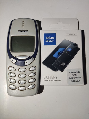 Nokia 3330 used with new battery and original charger