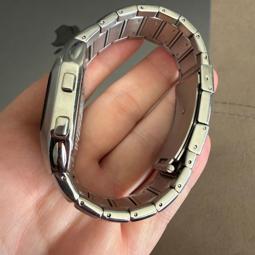 Fossil OLED JR-9465 watch like new, unisex, silver metal band