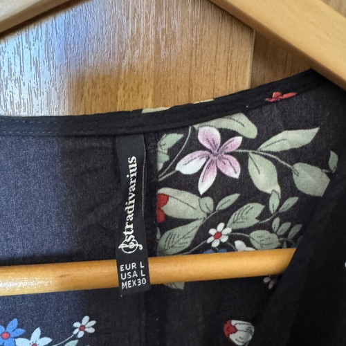 Floral Playsuit Arena like new, black base with pink lilac and blue shades