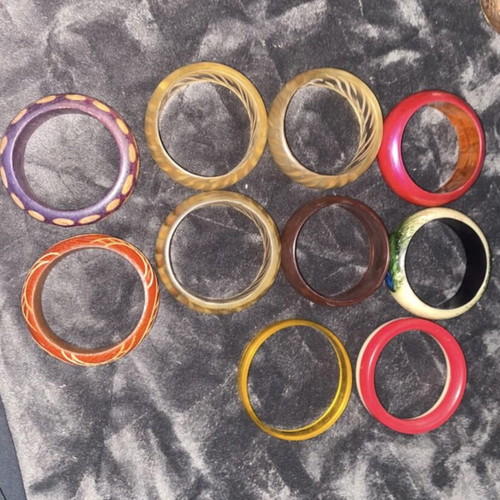 Bracelets new, wooden, plastic and iron multicolor
