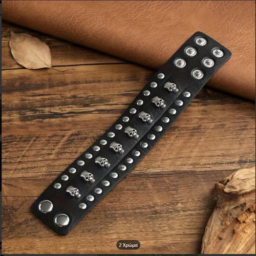 Leather bracelet new with studs and skulls black