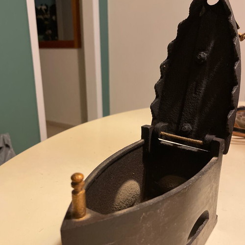Vintage cast iron charcoal iron with wooden handle and bronze details, like new, 1950s