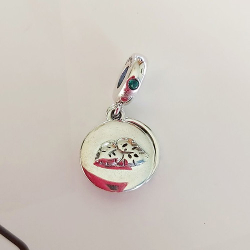 Pandora s925 Ale Lion King charm used, green and silver
