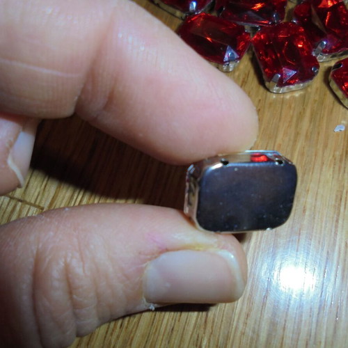 Set of 30 decorative red sewing stones like new