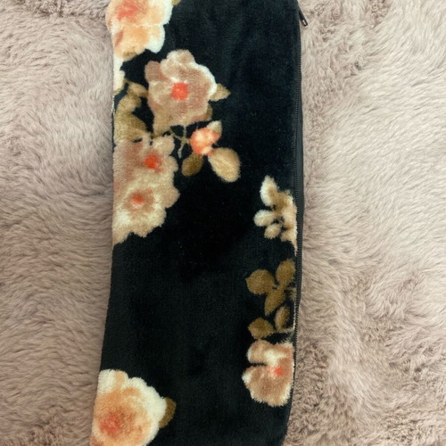 Toiletry bag like new black with flowers, spacious, rectangular