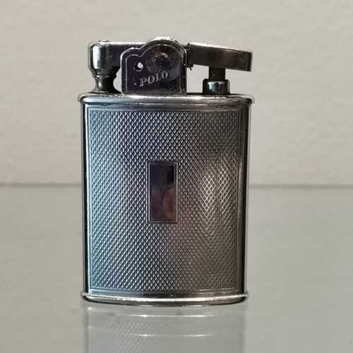 Polo lighter used vintage metal with embossed design