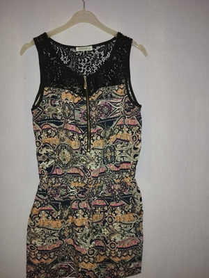 One-piece romper with lace top and front zipper, like new, sizes XL to XXL