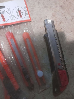 Set of new utility knives with 1 gift